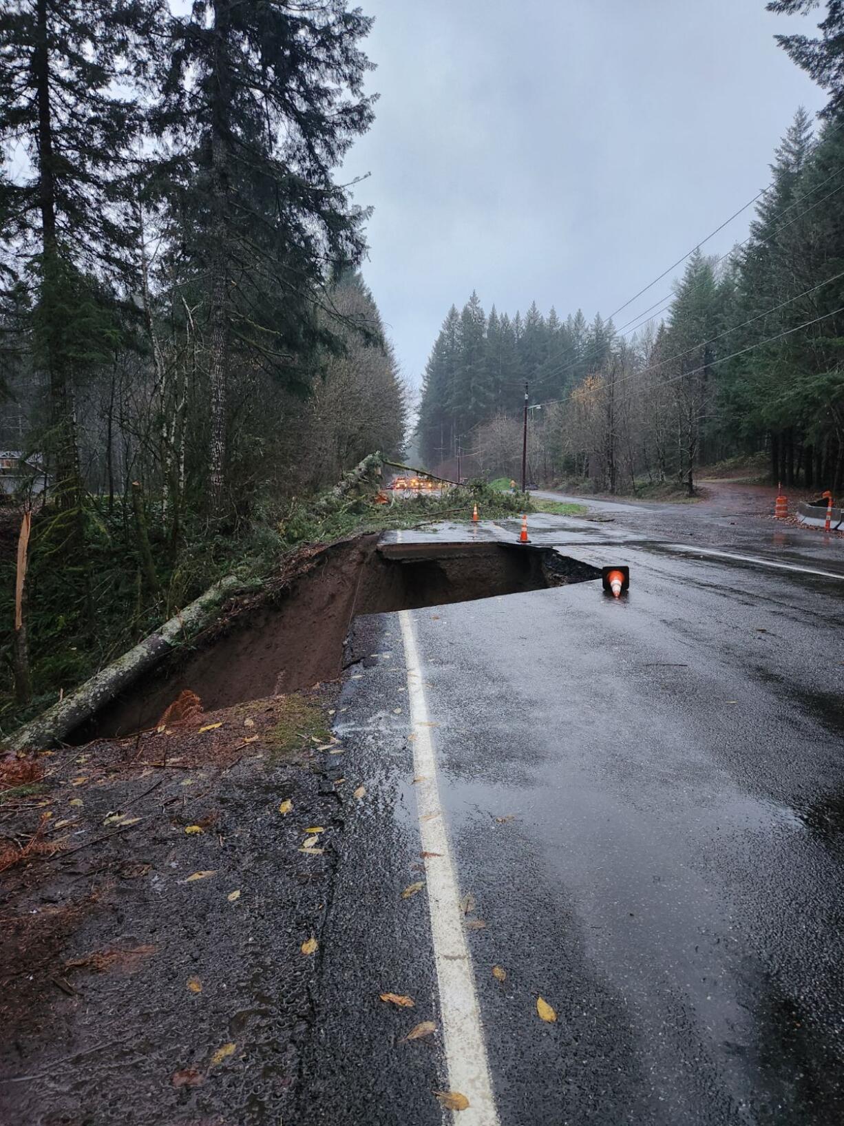 Lewis River Highway closed to traffic in both directions near Cougar on Tuesday after a landslide damage the road.