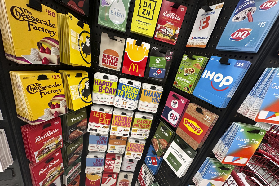 Gift cards are displayed at a Target store, in New York, Thursday, Dec. 21, 2023. Americans are expected to spend nearly $30 billion on gift cards this holiday season, according to the National Retail Federation. Restaurant gift cards are the most popular, making up one-third of those sales.