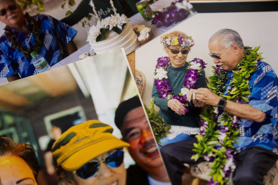 Photos of Sharlene Rabang, who was named as the 100th victim of the Lahaina wildfires after dying weeks after fleeing her home, Tuesday, Dec. 5, 2023, are seen at her husband Weslee Chinen&rsquo;s family home in Waipahu, Hawaii. Rabang, who had a previous history of cancer, COVID and high blood pressure, was not originally listed as a victim until her family fought to have her included, citing smoke inhalation as a contributing factor. Chinen was in Oahu at the time of the fires, and Rabang&rsquo;s son Brandon had to convince her to flee.