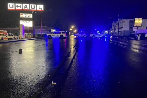 The Clark County Sheriff officers close off Highway 99 in Hazel Dell after a pedestrian was killed in a hit-and-run collision early Saturday, Dec. 2, 2023.