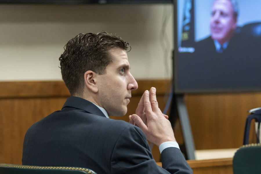 FILE - Bryan Kohberger listens to arguments during a hearing, Oct. 26, 2023, in Moscow, Idaho. Late Friday, Dec. 15, a judge ruled that the grand jury indictment of Kohberger, who is charged with killing four University of Idaho students, was conducted properly and will stand.