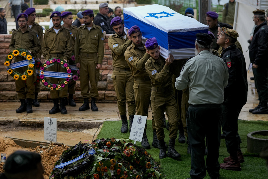 Israeli soldiers carry the flag-draped casket of Staff Sgt. Birhanu Kassie during his funeral at Mt. Herzl military cemetery in Jerusalem, Sunday, Dec. 24, 2023. Kassie, 22, was killed during Israel&#039;s ground operation in the Gaza Strip, where the Israeli army has been battling Palestinian militants in the war ignited by Hamas&#039; Oct. 7 attack into Israel.