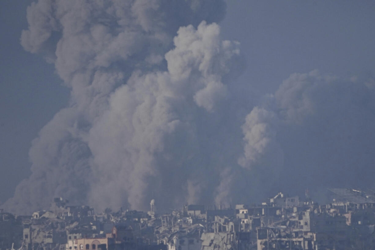 Smoke rises following an Israeli bombardment in the Gaza Strip, as seen from southern Israel , Wednesday, Dec. 6, 2023.