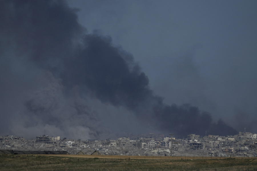 Smoke rises following an Israeli bombardment in the Gaza Strip, as seen from southern Israel, Tuesday, Dec. 26, 2023. The army is battling Palestinian militants across Gaza in the war ignited by Hamas&rsquo; Oct. 7 attack into Israel.