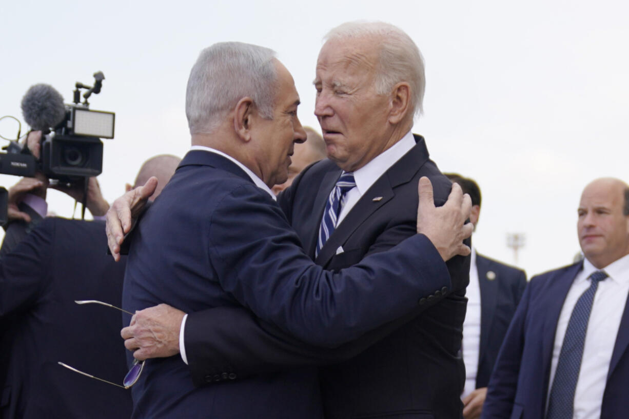 FILE - President Joe Biden is greeted by Israeli Prime Minister Benjamin Netanyahu after arriving at Ben Gurion International Airport, on Oct. 18, 2023, in Tel Aviv. The United States has offered strong support to Israel in its war against Hamas. But the allies ar increasingly at odds over what will happen to the Gaza Strip once the war winds down.