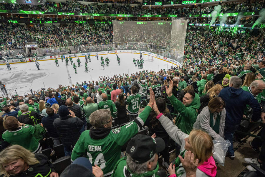 Dallas Stars fans celebrate after their team&rsquo;s overtime victory over the Seattle Kraken in an NHL hockey game Monday, Dec. 18, 2023, at American Airlines Center in Dallas.