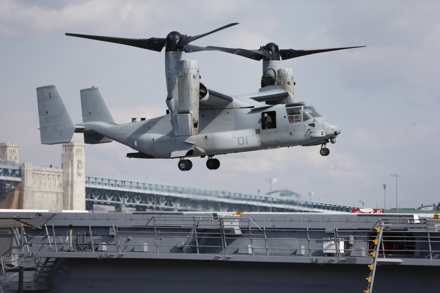 FILE - A Marines Osprey lands aboard the USS Somerset, Feb. 27, 2014, in Philadelphia.  A congressional oversight committee has launched an investigation into the V-22 Osprey program following the latest deadly crash,  which killed eight Air Force special operations service members. The entire Osprey fleet remains grounded following the crash, with the exception of some limited Marine Corps flights.