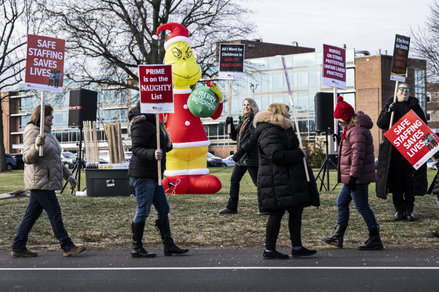 Nurses at Lower Bucks Hospital and Suburban Community Hospital protest on Friday, Dec. 22, 2023, during a strike rally outside the Lower Bucks Hospital in Bristol, Pa. (Jose F.