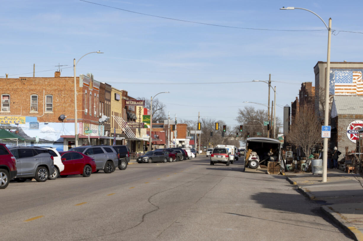 The 4th Street commercial strip in Grand Island, Neb., is shown on Wednesday, Dec. 6, 2023. When city administrator Laura McAloon learned of an opportunity, funded by the Bill and Melinda Gates Foundation, to study the development of a bus system in Grand Island, she jumped at it.