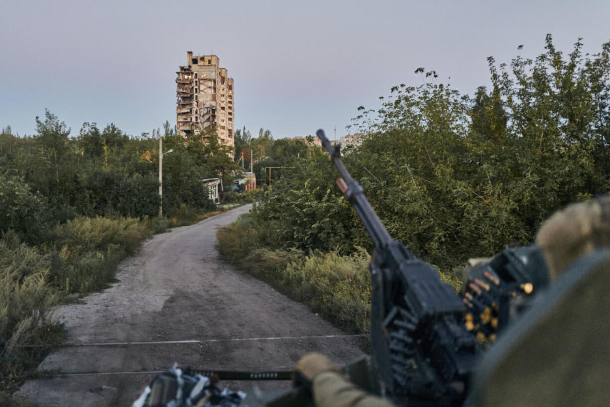FILE - A Ukrainian soldier sits in his position in Avdiivka, Donetsk region, Ukraine, on Aug. 18, 2023.