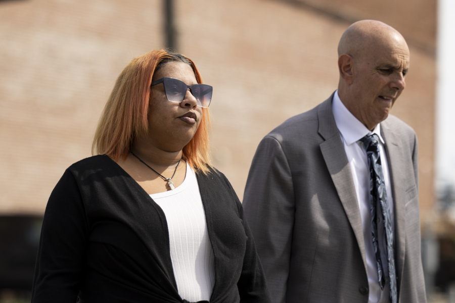 FILE - Deja Taylor arrives to the United States Courthouse, Sept. 21, 2023, in Newport News, Va., with her lawyer James Ellenson. Taylor, the mother of a 6-year-old boy who shot his teacher in Virginia, is scheduled to be sentenced for felony child neglect in the city of Newport News, Friday, Dec. 15.