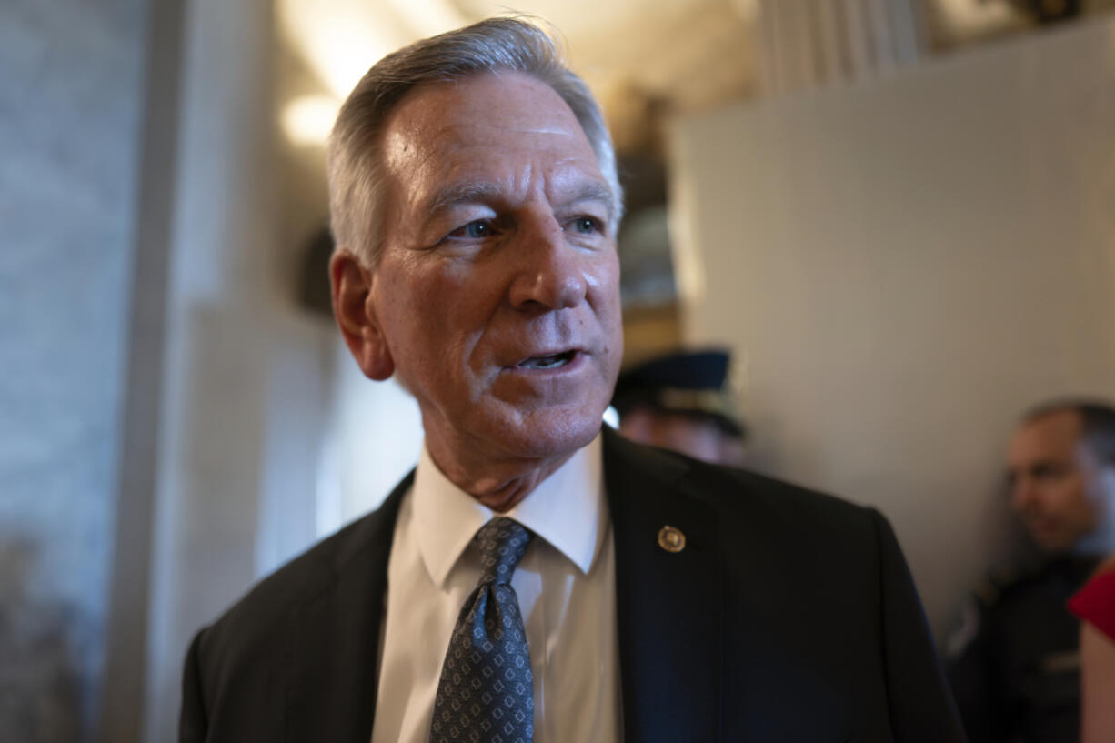 FILE - Sen. Tommy Tuberville, R-Ala., a member of the Senate Armed Services Committee, talks to reporters as he and other senators arrive at the chamber for votes, at the Capitol in Washington, Wednesday, Sept. 6, 2023. (AP Photo/J.