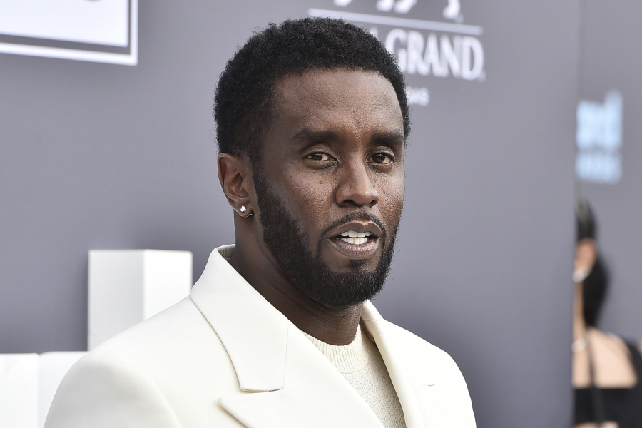 FILE - Music mogul and entrepreneur Sean &quot;Diddy&quot; Combs arrives at the Billboard Music Awards, May 15, 2022, in Las Vegas. A woman sued the hip-hop mogul on Wednesday, Dec. 6, 2023, claiming he and two other men raped her 20 years ago in a New York City recording studio when she was 17. The woman, whose name wasn&rsquo;t disclosed in the court filing, is the fourth person to file a lawsuit accusing Combs of sexual assault in recent weeks.