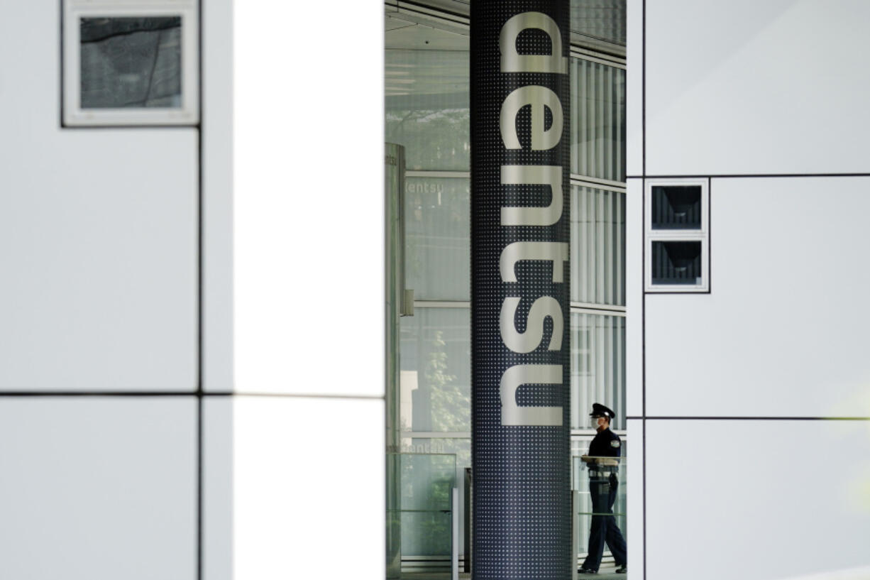 The headquarters of Japanese advertising company Dentsu Inc. is seen in Tokyo on June 5, 2020. The bid-rigging trial around the Tokyo Olympics played out Tuesday, Dec. 5, in a Japanese courtroom &mdash; more than two years after the Games closed &mdash; with advertising giant Dentsu and five other companies facing criminal charges.