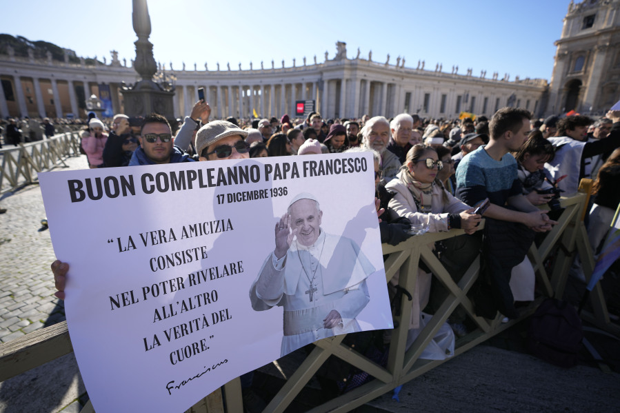 A man holds a banner reading &ldquo;happy birthday Pope Francis&rdquo; before the Angelus noon prayer in St.Peter&rsquo;s Square, at the Vatican, Sunday, Dec. 17, 2023. Pope Francis turned 87 on Dec.17.