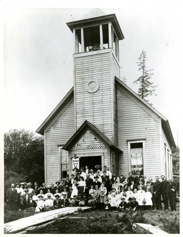 In 1908, the year the bell tower was added, the congregation gathered in front of the Salmon Creek Methodist Church dressed in their Sunday finest. The church later was moved from this location to the east side of Northeast Highway 99.