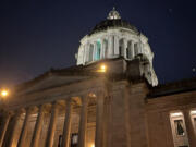 Washington State Legislative Building at night.