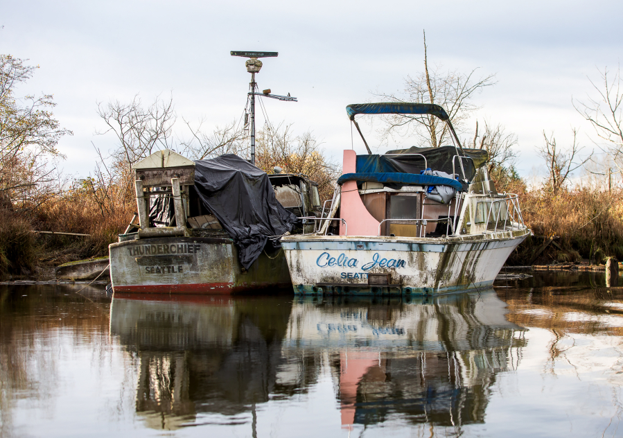 A pair of tethered boats seen Nov. 21 along Union Slough in Everett.