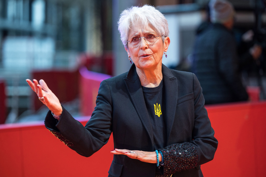 Joan Baez speaks to journalists Feb. 17 on the red carpet for the film &ldquo;Joan Baez: I Am a Noise&rdquo; during the 73rd Berlinale in Berlin.