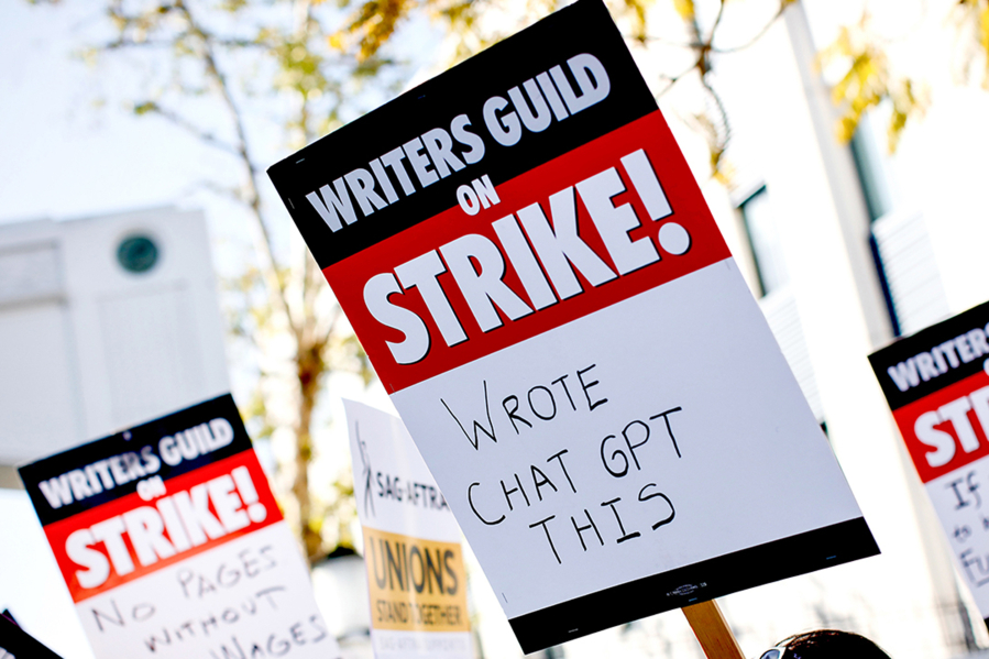 Concern that studios will downgrade screenwriters to reworking AI-produced scripts is one of the issues animating the strike declared on May 2, 2023, by the Writers Guild of America. (Jay L.