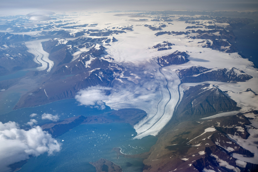 A range of half-melted glaciers in Scoresby Fjord near Ittoqqortoormiit, Greenland, Aug. 21. The Greenland ice sheet is disappearing much faster than previously thought, according to new research.