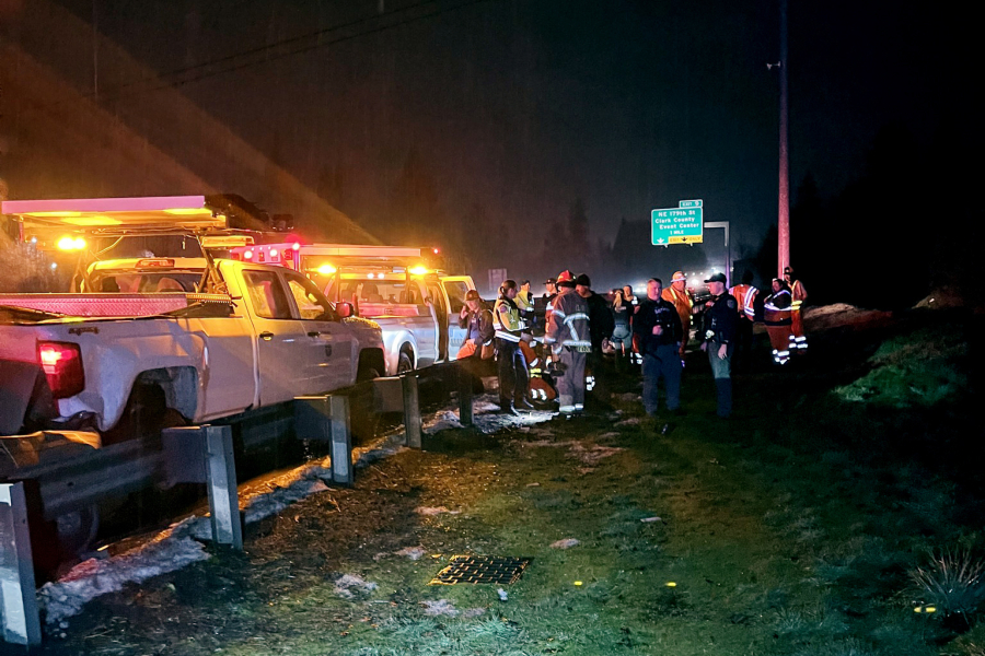 The scene of a Sunday night crash in which a Chevrolet Impala, driven by a suspected drunk driver, rear-ended a Washington State Department of Transportation truck, pushing it into another truck on the shoulder of Interstate 5 near Milepost 8. All six of the road workers who were injured in the crash were discharged from hospitals by Monday afternoon.