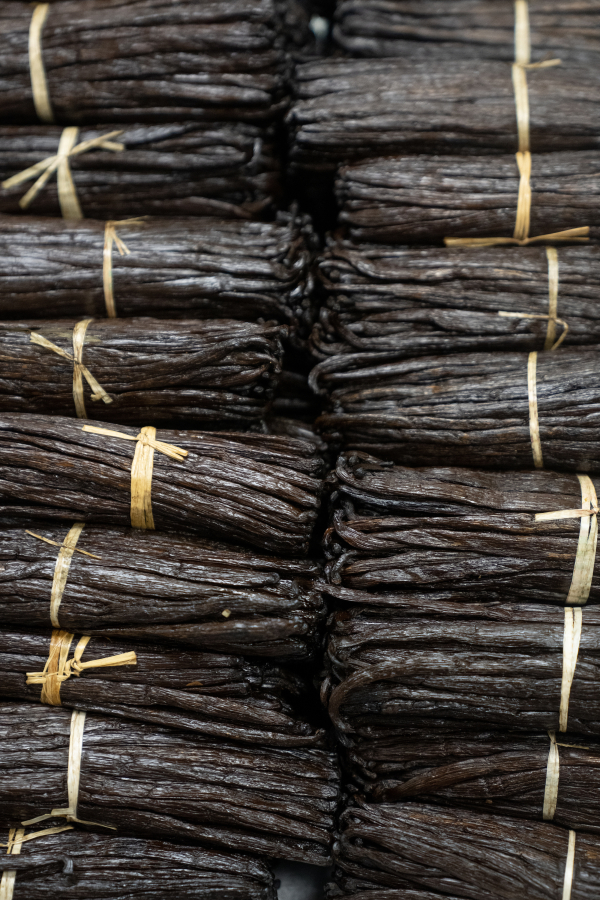 Bundles of raw vanilla beans are stacked up Wednesday, Jan. 17, 2024, at Vanilla Bean Project in Lakeland, Minnesota. The small Minnesota company is the first in the world to offer Regenerative Organic Certified vanilla extracts.