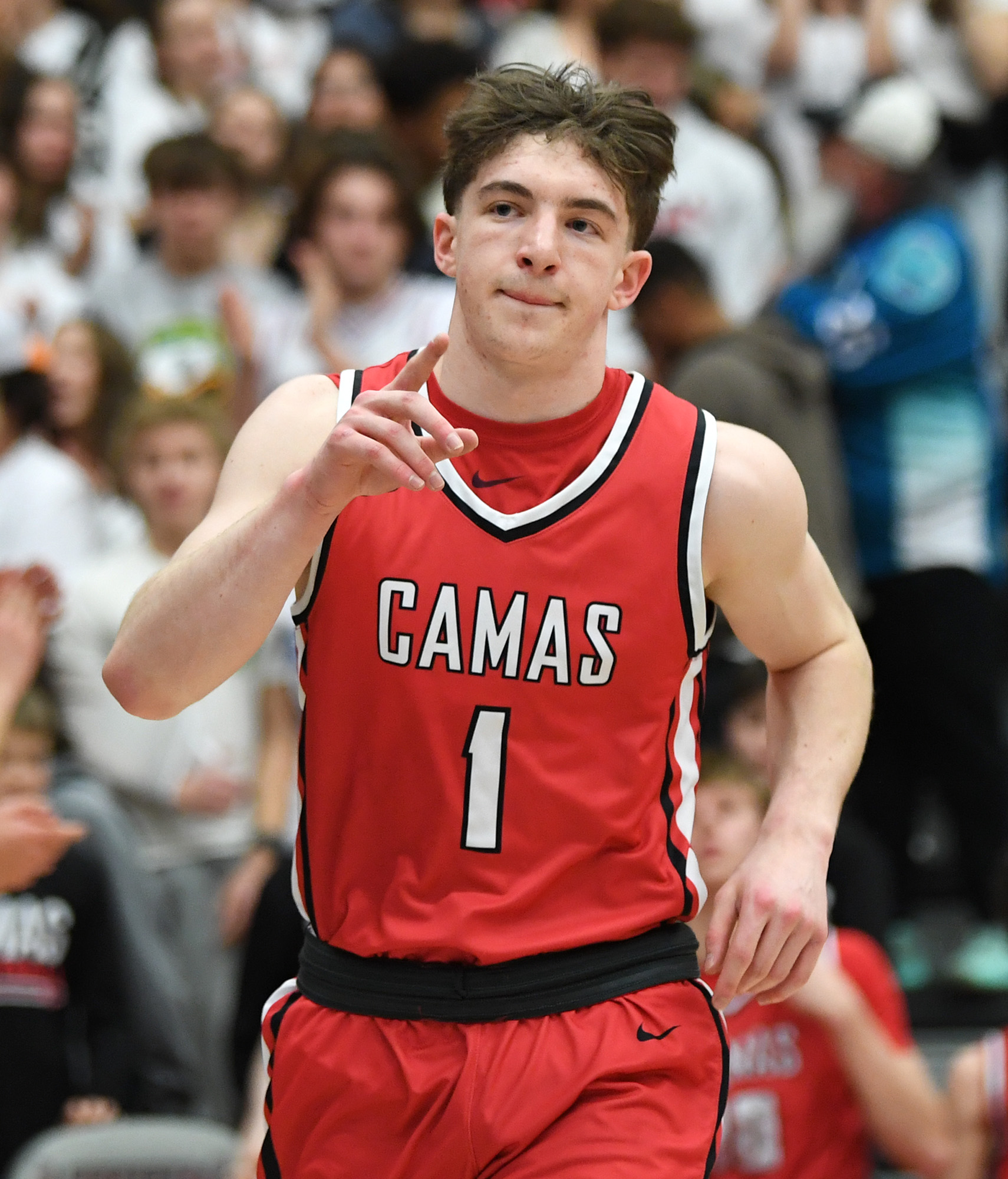 Camas junior Beckett Currie points during pregame introductions Tuesday, Jan. 2, 2024, during the Papermakers’ 71-33 win against Union at Union High School.