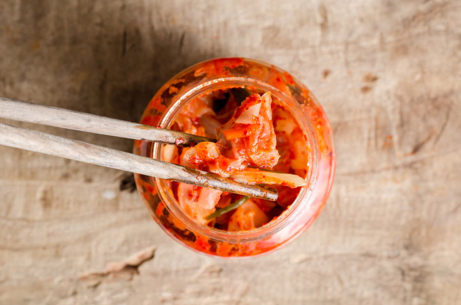 Kimchi is made out of salted and fermented vegetables, such as napa cabbage and Korean radish.