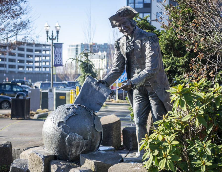 A statue of Capt. George Vancouver sits across from Vancouver City Hall.