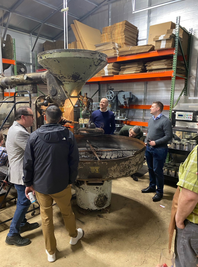 A group of executives and engineers from Probat Inc., visited the roaster at Pull Caffe in Yacolt.