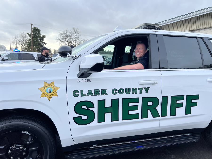 Clark County sheriff&rsquo;s Deputy Drew Kennison poses inside his new patrol SUV on Friday before returning to first patrol shift Saturday morning since a snow-heavy tree crushed his previous vehicle. He returned to light-duty five months after the crash, and he hopes to rejoin the SWAT team by the end of February.