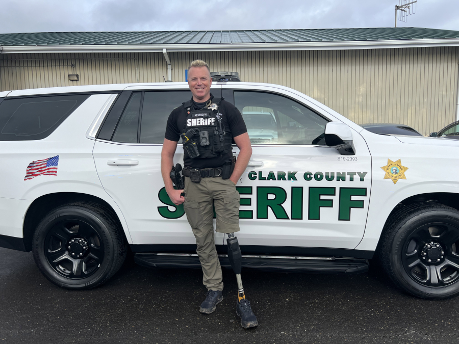 Clark County sheriff’s Deputy Drew Kennison stands tall after losing ...