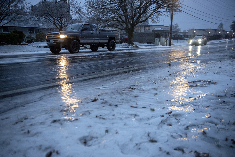 Motorists in southeast Vancouver carefully drive along icy roads Wednesday morning.