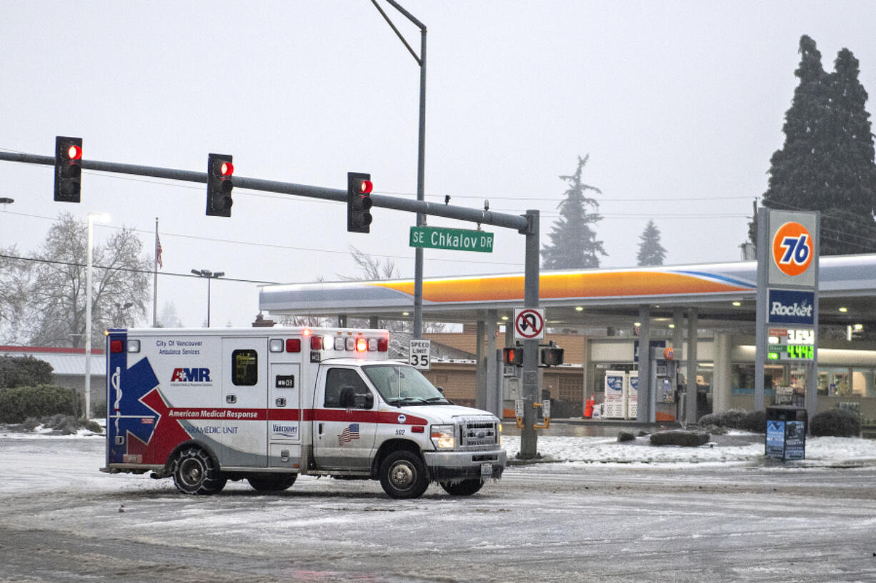 An ambulance responds to a call in southeast Vancouver during an ice storm Jan. 17.