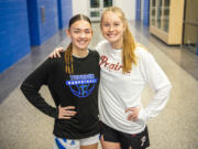 *LEADOPTION* Mountain View senior Nina Peterson, left, and Prairie senior Claire Smith stand for a portrait Wednesday, Jan. 24, 2024, at Mountain View High School. The two are longtime friends but are rivals on the court. Peterson and Smith are both attending Corban University next year.