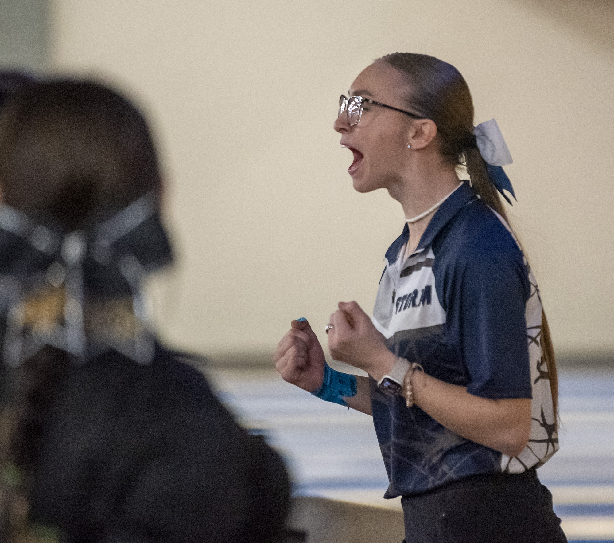 Skyview’s Addysen Case celebrates after a throw Friday, Jan. 26, 2024, during the WIAA District 4 3A/4A championships at Hazel Dell Lanes.