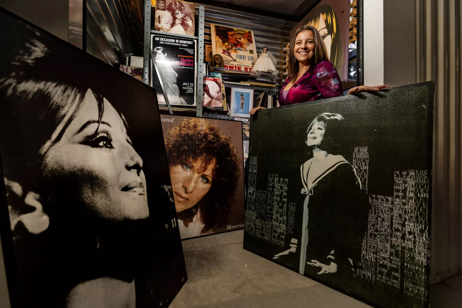 Mara Papalas stands inside one of the six storage units that her father filled with Barbra Streisand memorabilia.