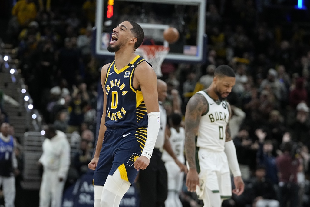 Indiana Pacers' Tyrese Haliburton (0) reacts during the second half of an NBA basketball game against the Milwaukee Bucks, Wednesday, Jan. 3, 2024, in Indianapolis.