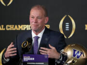 Washington head coach Kalen DeBoer speaks during a news conference ahead of the national championship NCAA College Football Playoff game between Washington and Michigan Sunday, Jan. 7, 2024, in Houston. He told his team on Friday, Jan. 12, 2024, that he's leaving to take the head coaching position at Alabama. (AP Photo/David J.