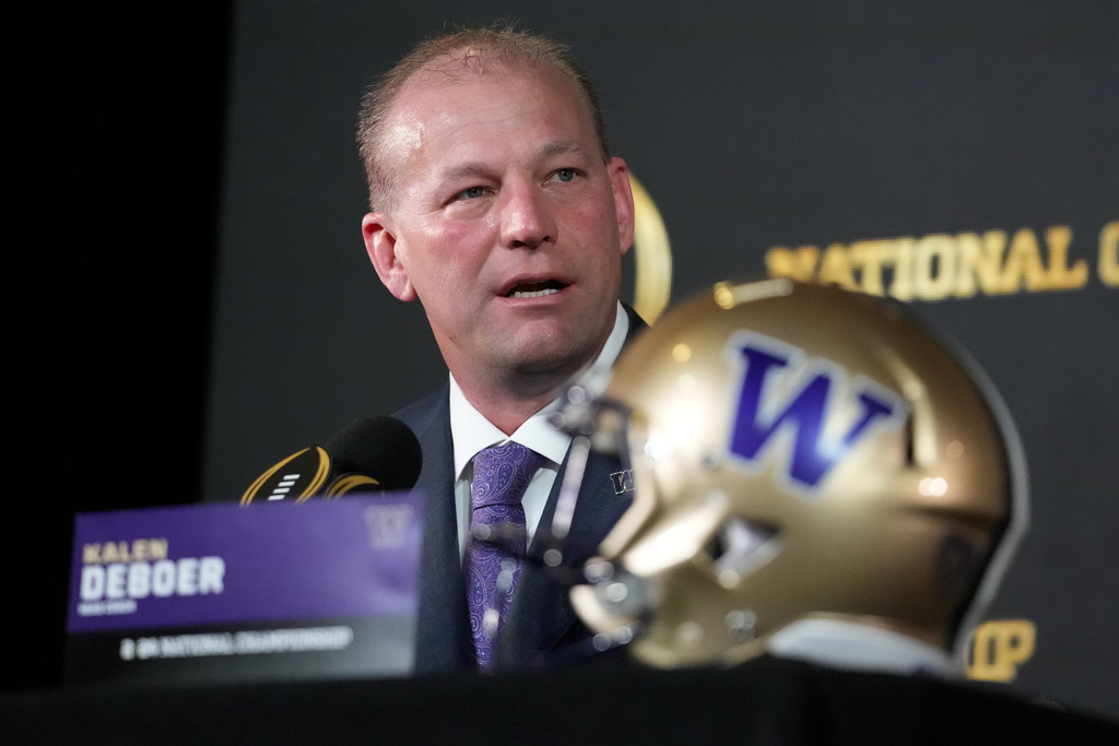 Washington head coach Kalen DeBoer speaks during a news conference ahead of the national championship NCAA College Football Playoff game between Washington and Michigan Sunday, Jan. 7, 2024, in Houston. The game will be played Monday. (AP Photo/Godofredo A.