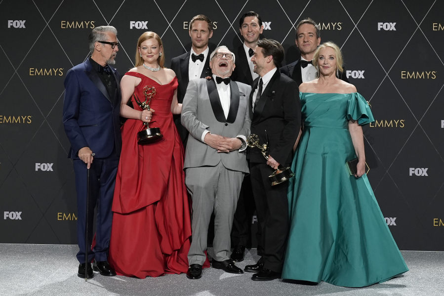 Alan Ruck, from left, Sarah Snook, Alexander Skarsgard, Brian Cox, Nicholas Braun, Kieran Culkin, Matthew Macfayden, and J. Smith-Cameron, winners of the award for outstanding drama series for &ldquo;Succession,&rdquo; pose in the press room during the 75th Primetime Emmy Awards on Monday, Jan. 15, 2024, at the Peacock Theater in Los Angeles.
