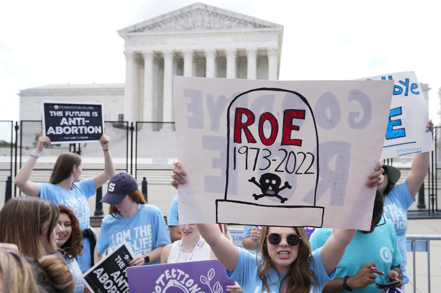 FILE - Demonstrators protest about abortion outside the Supreme Court in Washington, June 24, 2022. The key consequence of the June 2022 Supreme Court&rsquo;s Dobbs v. Jackson Women&rsquo;s Health Organization ruling was to return decision-making on abortion policy to individual states.
