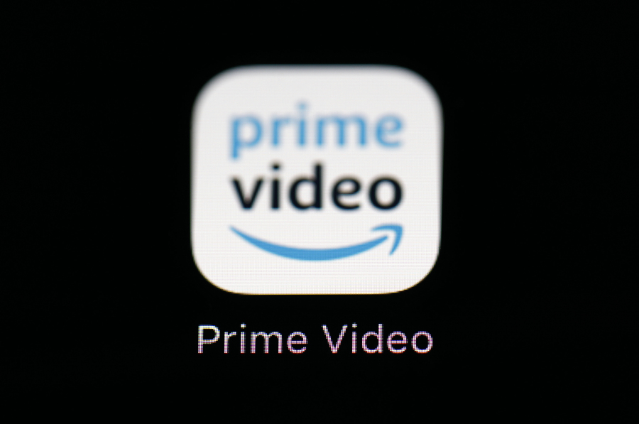 FILE - This March 19, 2018 file photo shows Amazon&rsquo;s Prime Video streaming app on an iPad in Baltimore. Amazon is cutting several hundred positions across its Prime Video and MGM Studios unit.