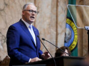 FILE - Washington Gov. Jay Inslee delivers his annual State of the State address to a joint legislative session in House chambers at the Washington state Capitol, Tuesday, Jan. 9, 2024, in Olympia, Wash. Inslee on Tuesday, Jan. 30, called for the state to develop best practices on how agencies should use generative artificial intelligence as it continues to incorporate the technology into government operations.