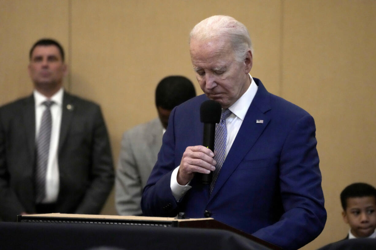 President Joe Biden bows his head in a moment of silence for the three American troops killed Sunday, Jan. 28, 2024, in a drone strike in northeast Jordan, while speaking at the &ldquo;Sunday Lunch&rdquo; event at the Brookland Baptist Banquet Center, part of the Brookland Baptist Church, in West Columbia, S.C., on Sunday, Jan. 28, 2024.