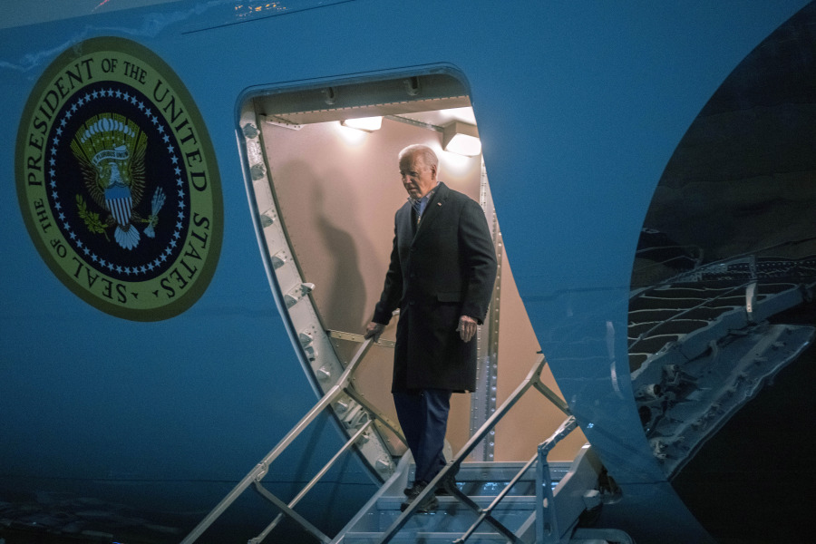 President Joe Biden walks down Air Force One at Andrews Air Force Base, Md., Thursday, Jan. 18, 2024.