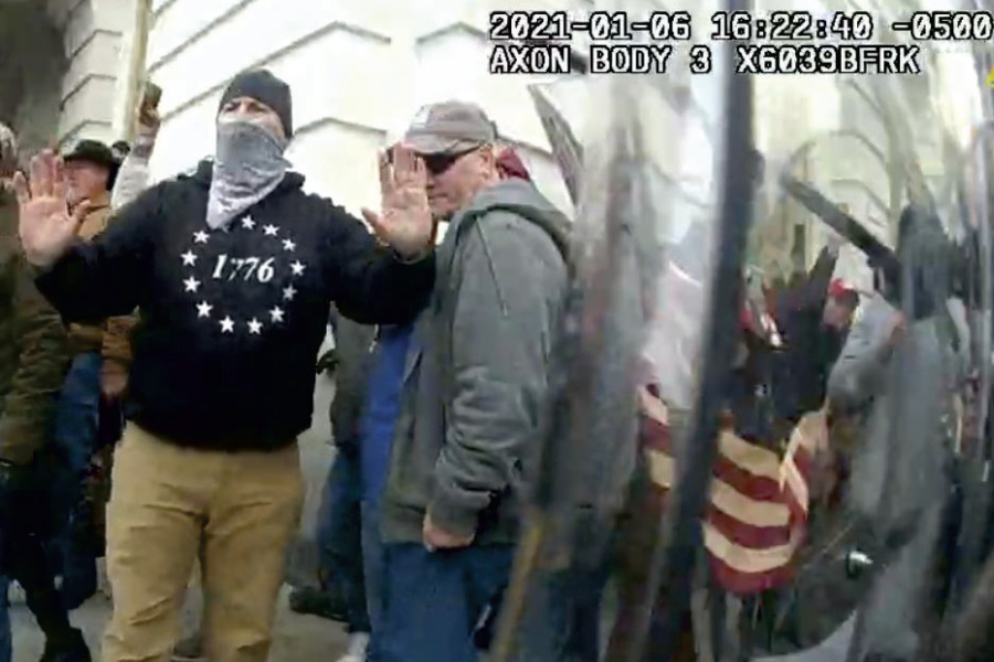 This image from police body-worn video and contained in the Justice Department statement of facts supporting the arrest of Frank Dahlquist, shows Dahlquist outside the U.S. Capitol on Jan. 6, 2021, in Washington. Dahlquist was charged Wednesday, Jan. 10, 2024, with spraying a chemical irritant on police officers during the riot at the U.S. Capitol.