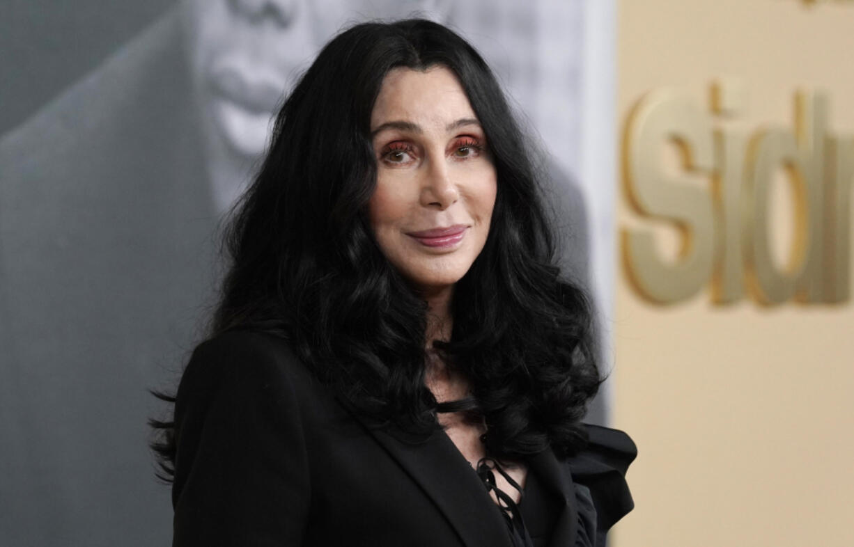 FILE - Cher poses at the premiere of the documentary film &ldquo;Sidney,&rdquo; Sept. 21, 2022, in Los Angeles. Cher has filed a petition to become a temporary conservator overseeing her son&rsquo;s money, saying his struggles with mental health and substance abuse have left him unable to manage his assets and potentially put his life in danger. The Oscar and Grammy winning singer and actor on Wednesday, Dec. 27, 2023, filed the petition in Los Angeles Superior Court that would give her temporary control of the finances of Elijah Blue Allman, her 47-year-old son with musician Gregg Allman.