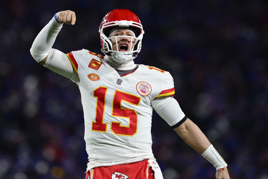 Kansas City Chiefs quarterback Patrick Mahomes (15) reacts after beating the Buffalo Bills in an NFL AFC division playoff football game, Sunday, Jan. 21, 2024, in Orchard Park, N.Y.